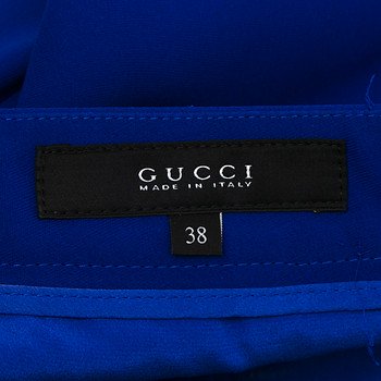 бирка Брюки Gucci