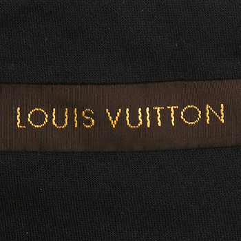 бирка Брюки Louis Vuitton