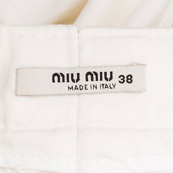 бирка Брюки Miu Miu