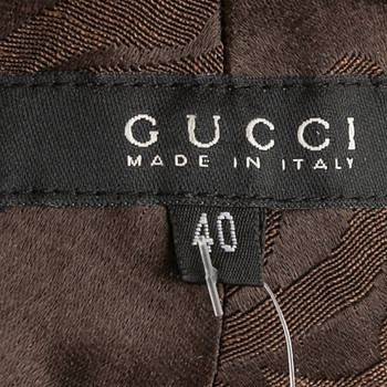 бирка Брюки Gucci