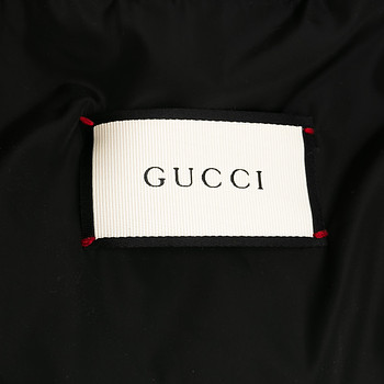 бирка Пуховик Gucci