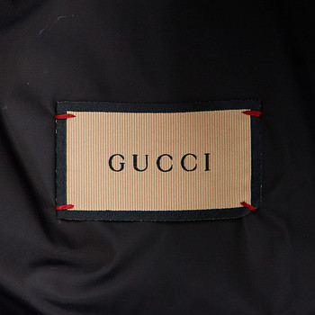 бирка Пуховик Gucci