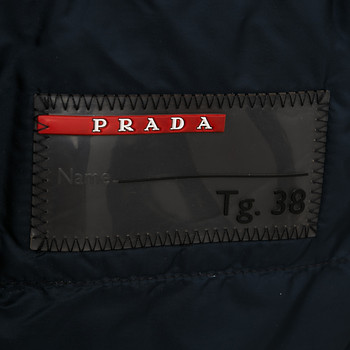 бирка Пуховик Prada