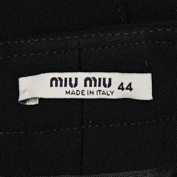 бирка Брюки Miu Miu