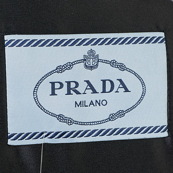 бирка Пуховик Prada