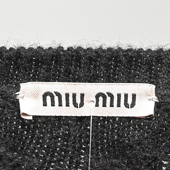 бирка Свитер Miu Miu