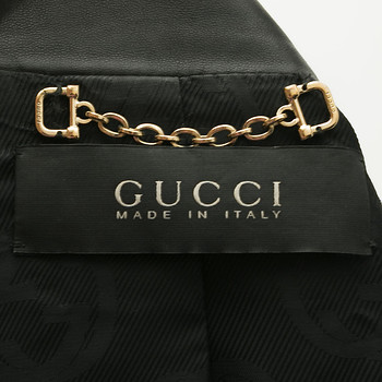 бирка Кожаная куртка Gucci