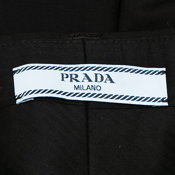 бирка Брюки Prada