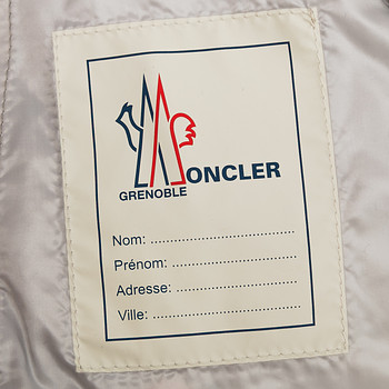 бирка Пуховик Moncler