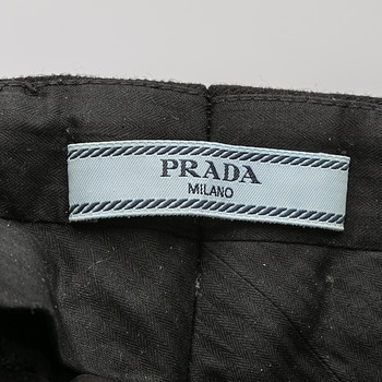бирка Брюки Prada
