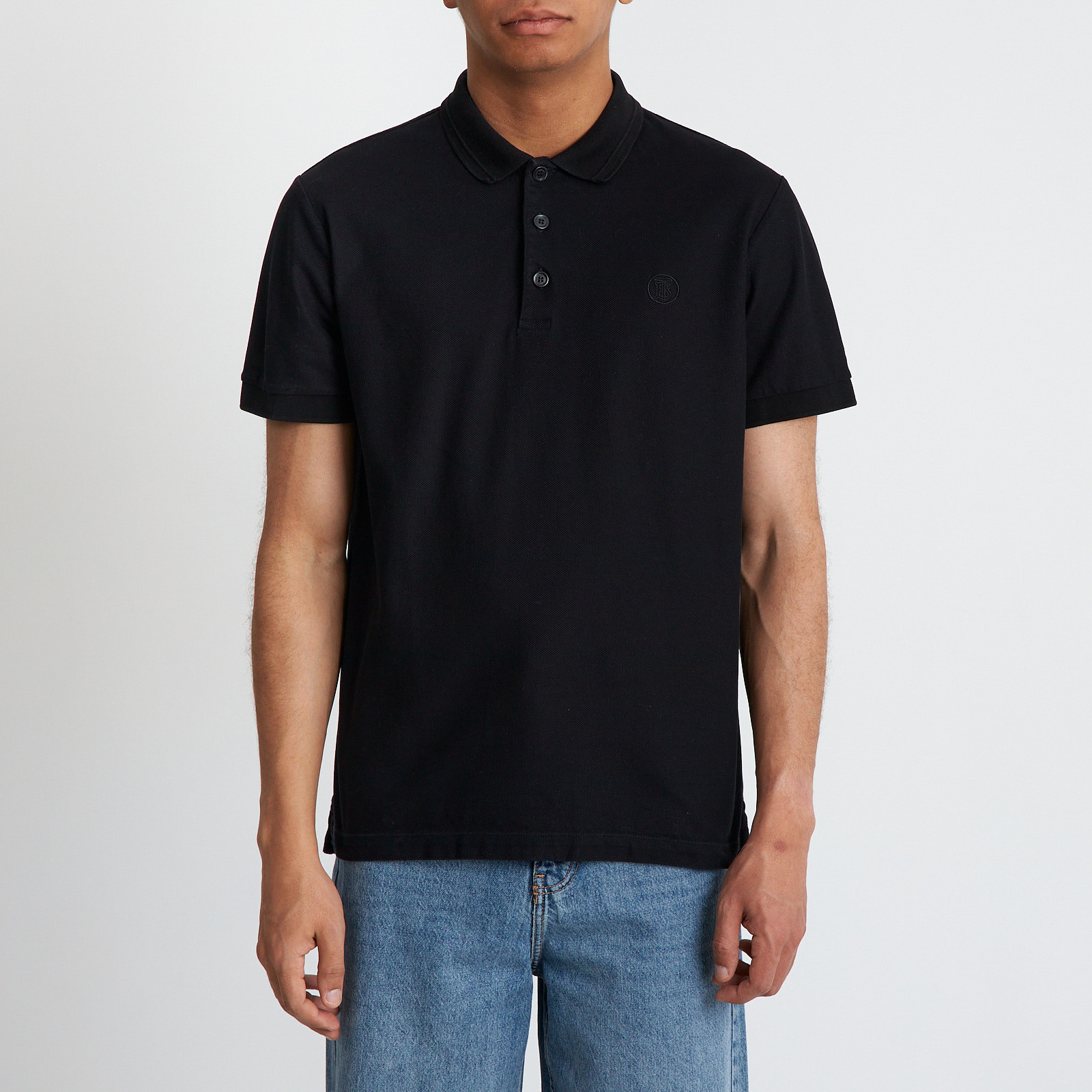 Поло черного цвета Burberry - фото из каталога магазина брендовой одежды Second Friend Store Поло Burberry - купить оригинал в секонд-хенде SFS - 1