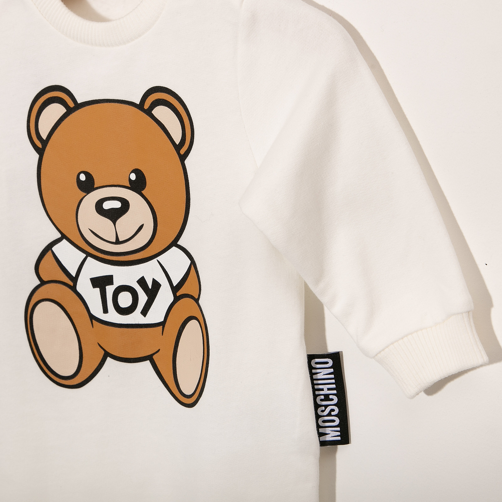 Комбинезон белого цвета Moschino - фото из каталога магазина брендовой одежды Second Friend Store Комбинезон Moschino - купить оригинал в секонд-хенде SFS - 3