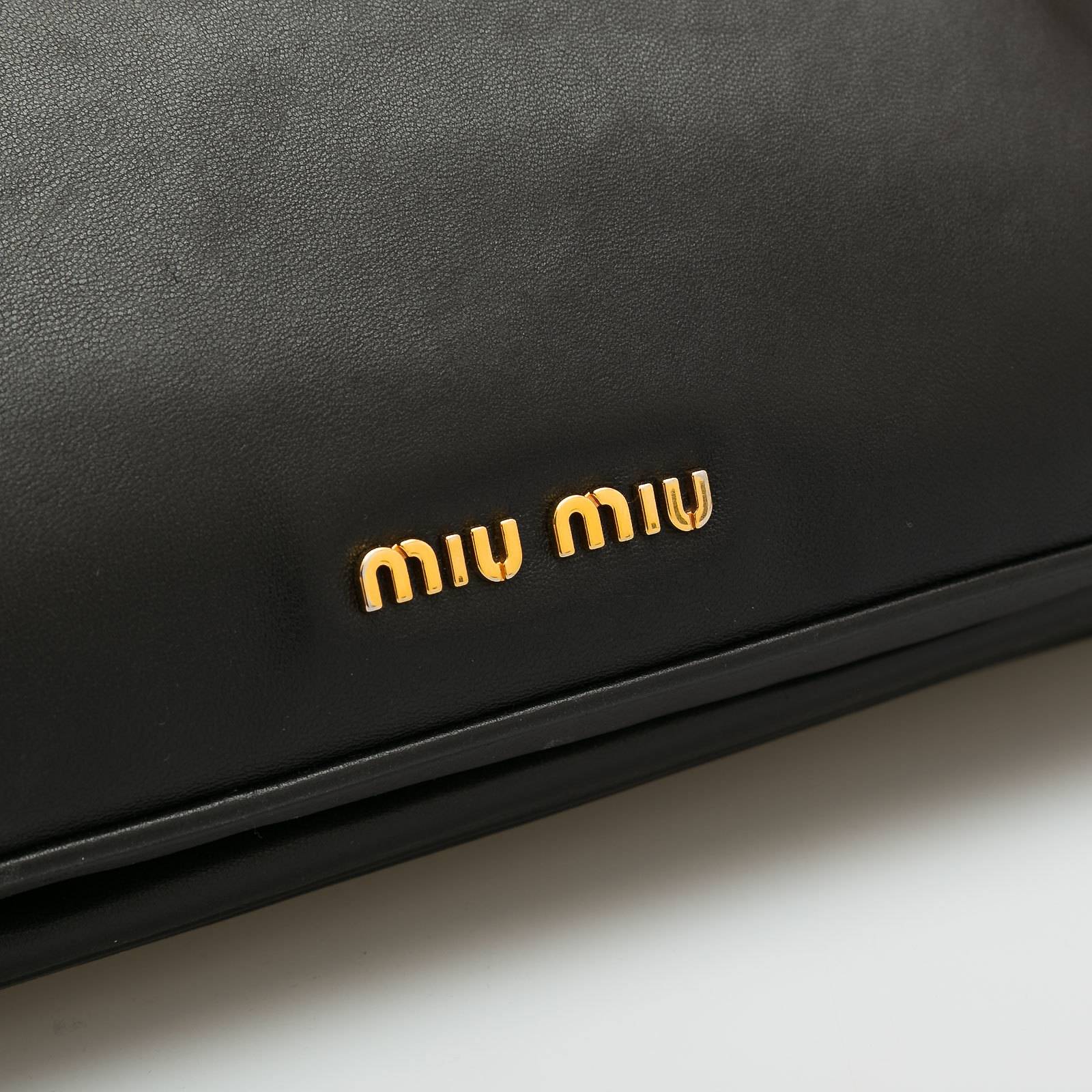 Клатч Miu Miu - купить оригинал в секонд-хенде SFS