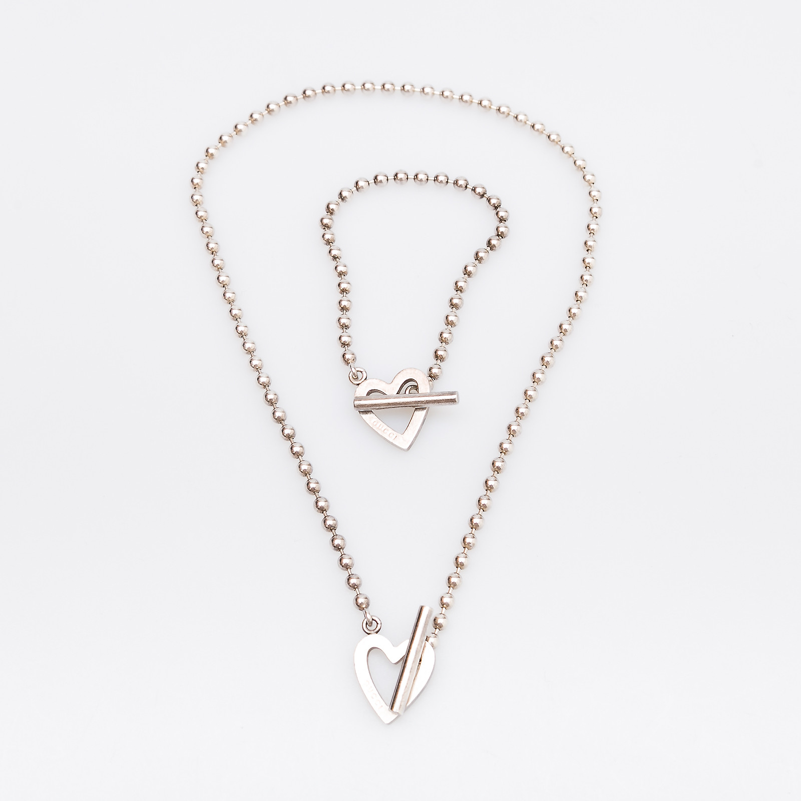 Комплект  серебряного цвета Gucci - фото из каталога магазина брендовой одежды Second Friend Store Комплект Gucci - купить оригинал в секонд-хенде SFS - 1