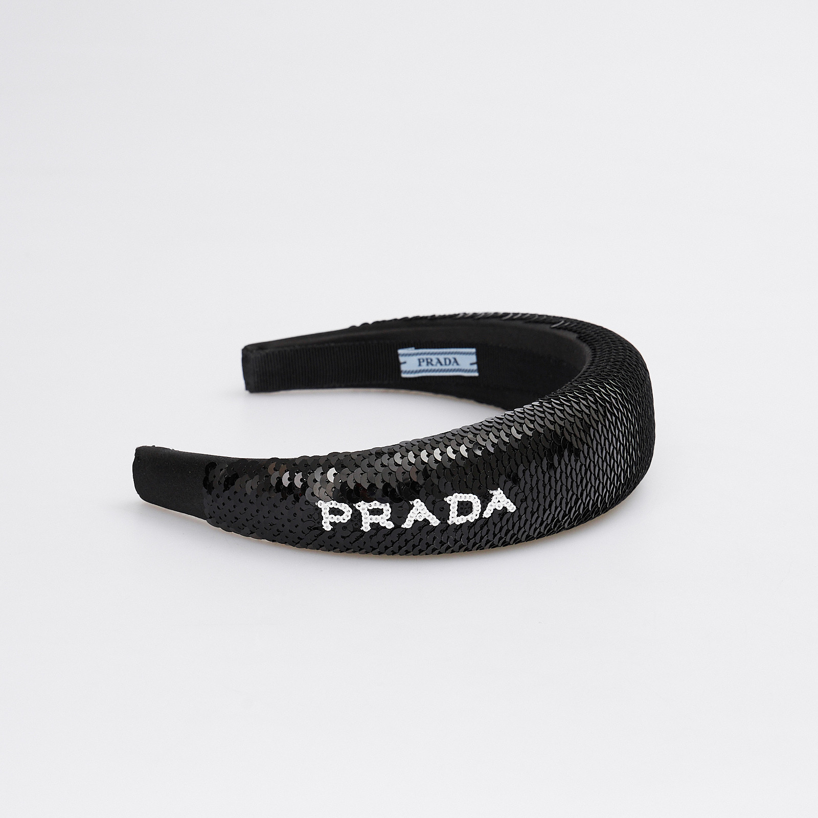 Ободок черного цвета Prada - фото из каталога магазина брендовой одежды Second Friend Store Ободок Prada - купить оригинал в секонд-хенде SFS - 1