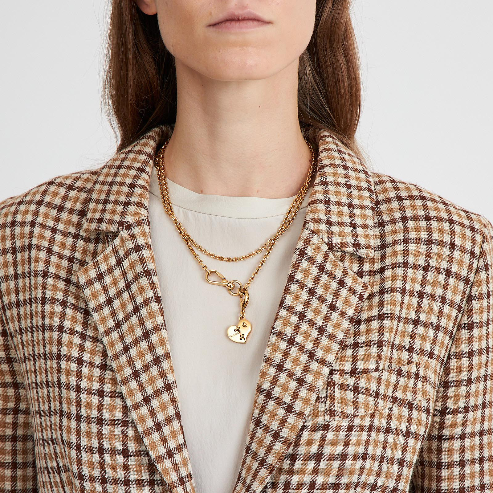 Колье золотого цвета Prada - фото из каталога магазина брендовой одежды Second Friend Store Колье Prada - купить оригинал в секонд-хенде SFS - 2