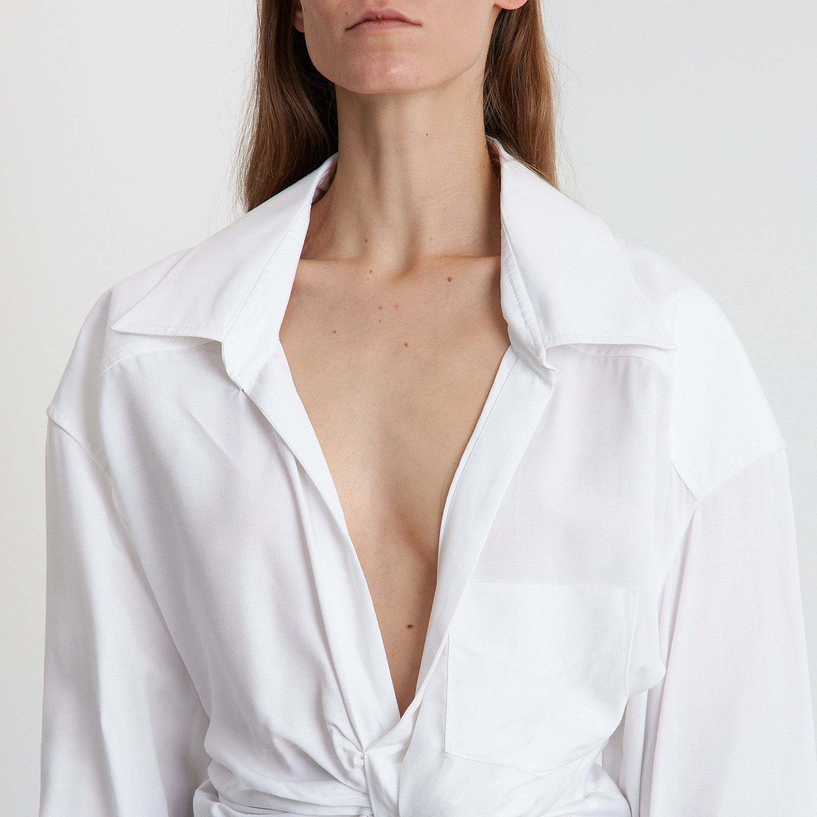 Рубашка  белого цвета Jacquemus - фото из каталога магазина брендовой одежды Second Friend Store Рубашка Jacquemus - купить оригинал в секонд-хенде SFS - 4