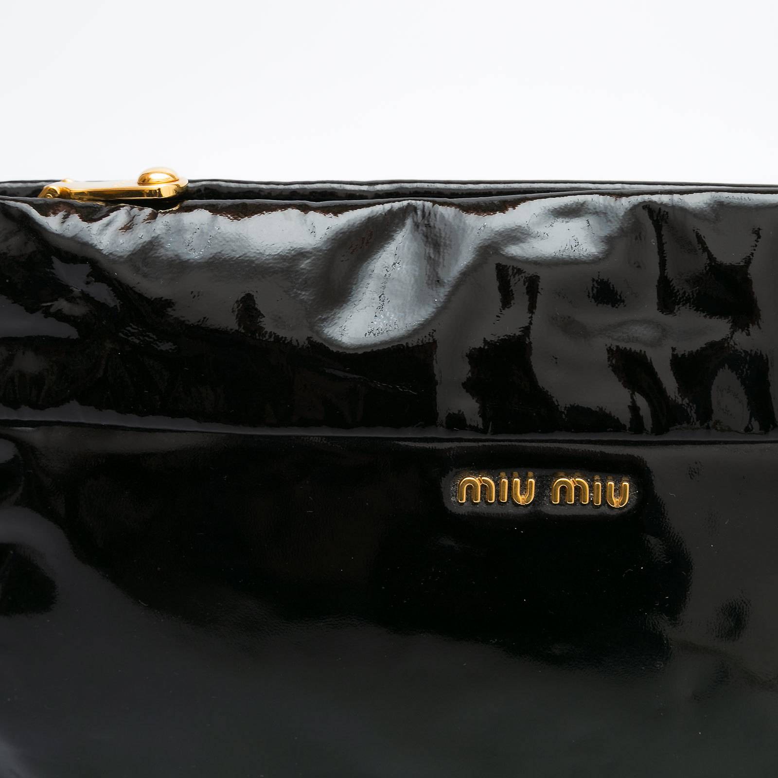 Клатч Miu Miu - купить оригинал в секонд-хенде SFS