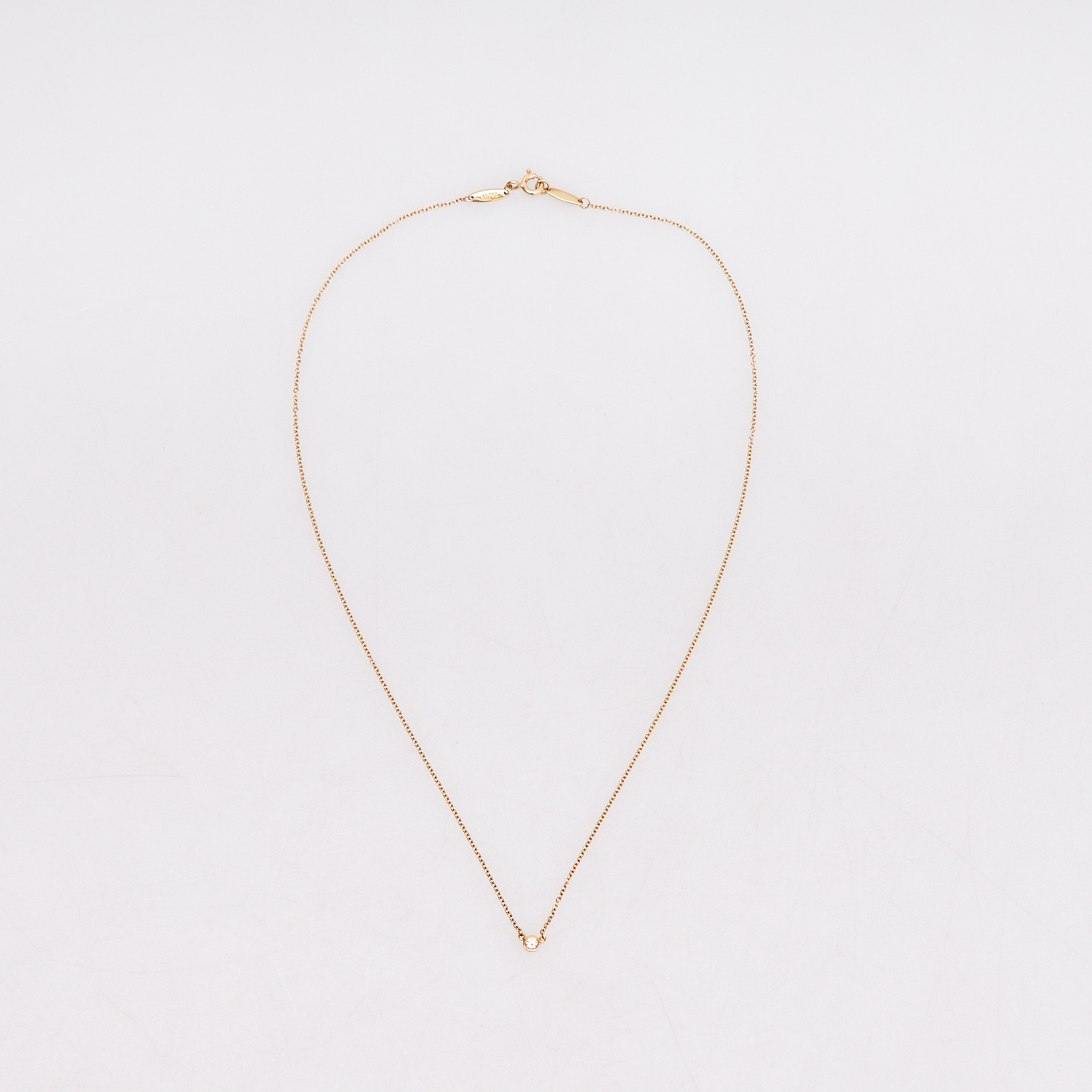 Подвеска золотого цвета Tiffany&Co - фото из каталога магазина брендовой одежды Second Friend Store Подвеска Tiffany&Co - купить оригинал в секонд-хенде SFS - 1