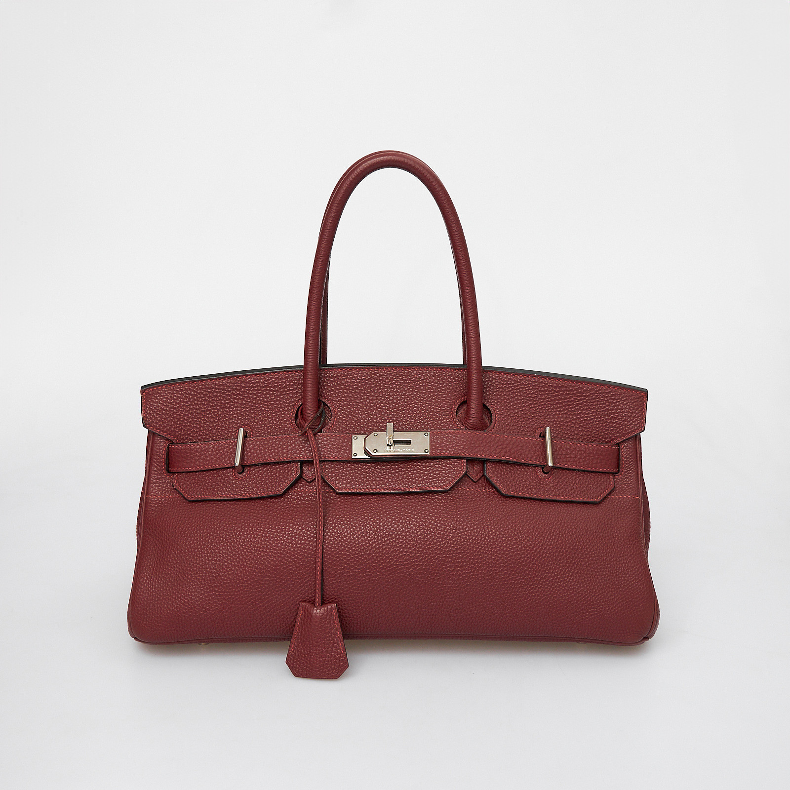 Сумка  бордового цвета Hermes - фото из каталога магазина брендовой одежды Second Friend Store Сумка Hermes - купить оригинал в секонд-хенде SFS - 1