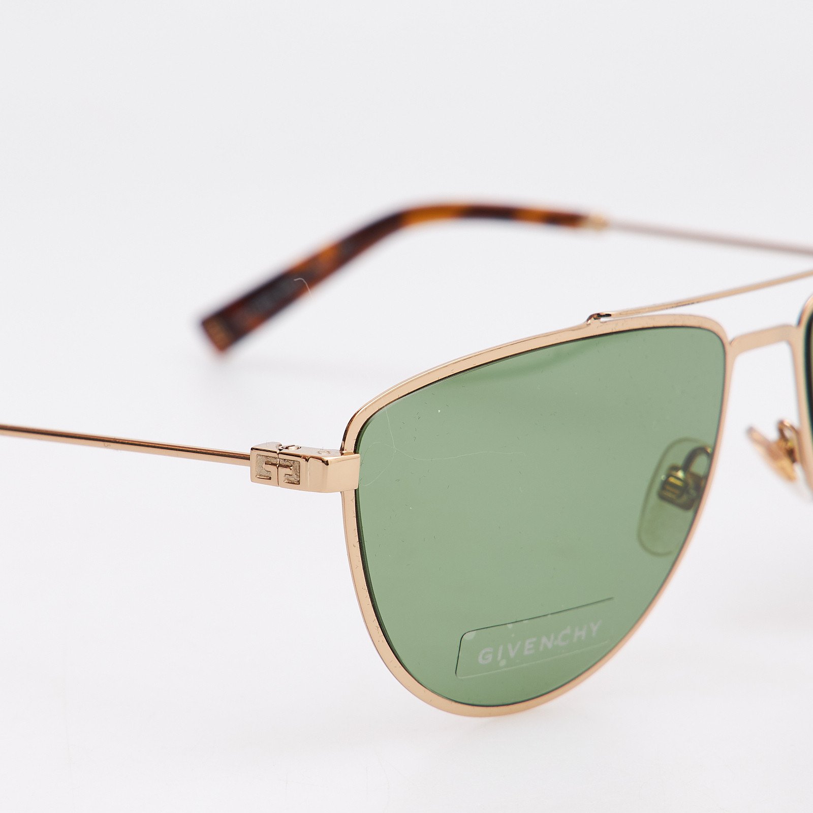 Очки  зеленого цвета Givenchy - фото из каталога магазина брендовой одежды Second Friend Store Очки Givenchy - купить оригинал в секонд-хенде SFS - 4