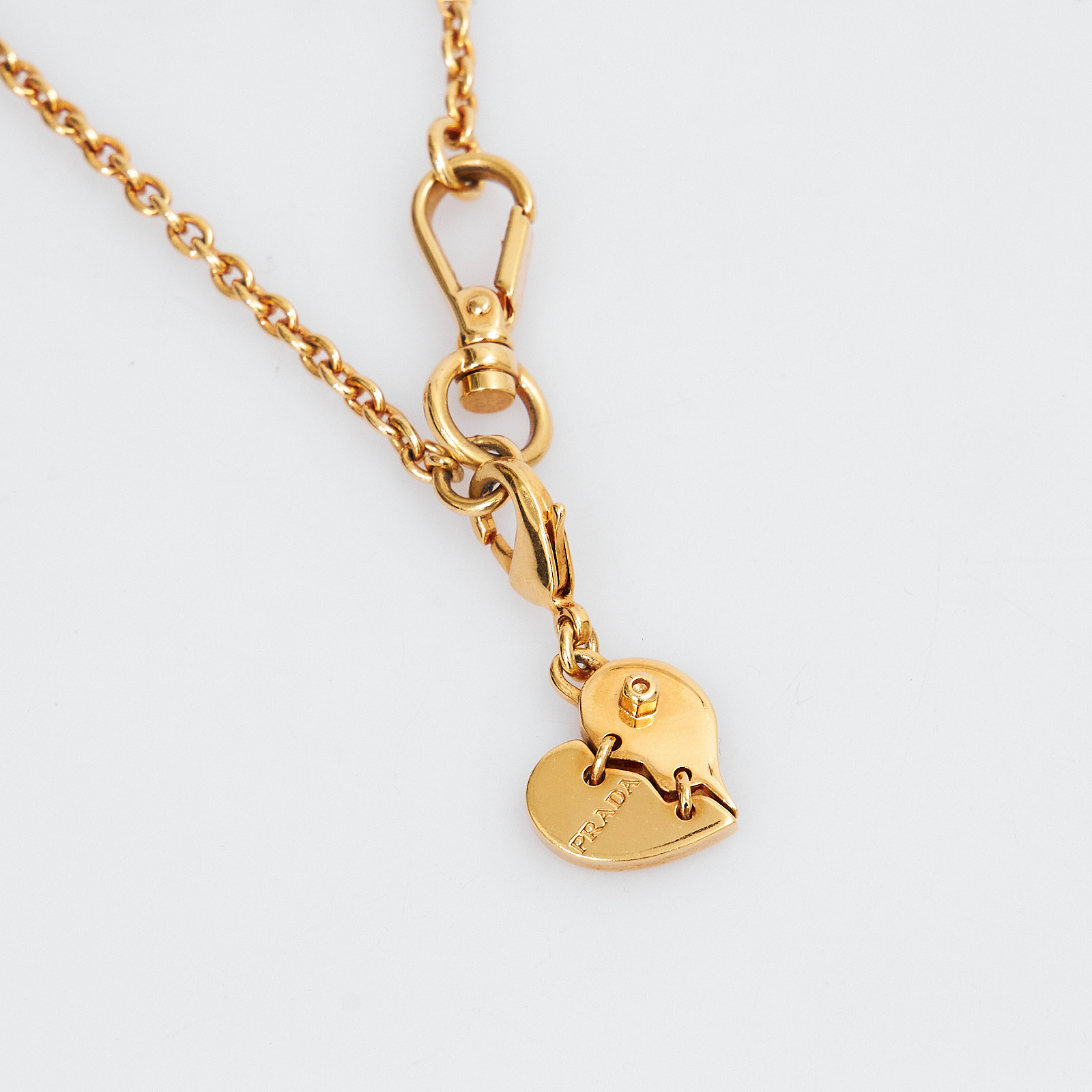 Колье золотого цвета Prada - фото из каталога магазина брендовой одежды Second Friend Store Колье Prada - купить оригинал в секонд-хенде SFS - 3