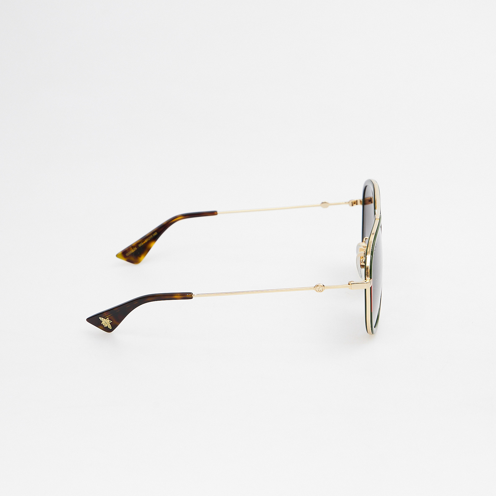 Очки зеленого цвета Gucci - фото из каталога магазина брендовой одежды Second Friend Store Очки Gucci - купить оригинал в секонд-хенде SFS - 4