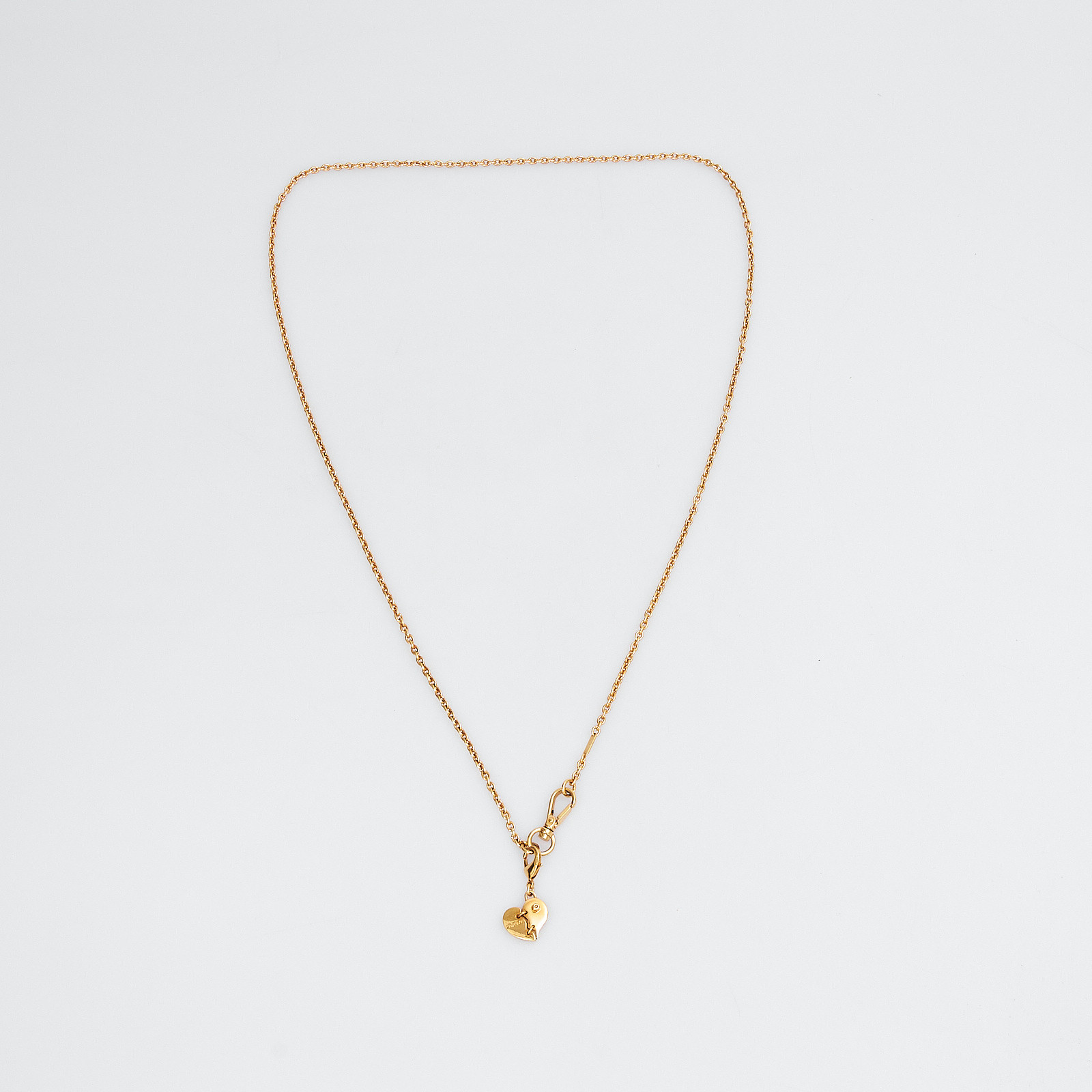 Колье золотого цвета Prada - фото из каталога магазина брендовой одежды Second Friend Store Колье Prada - купить оригинал в секонд-хенде SFS - 1